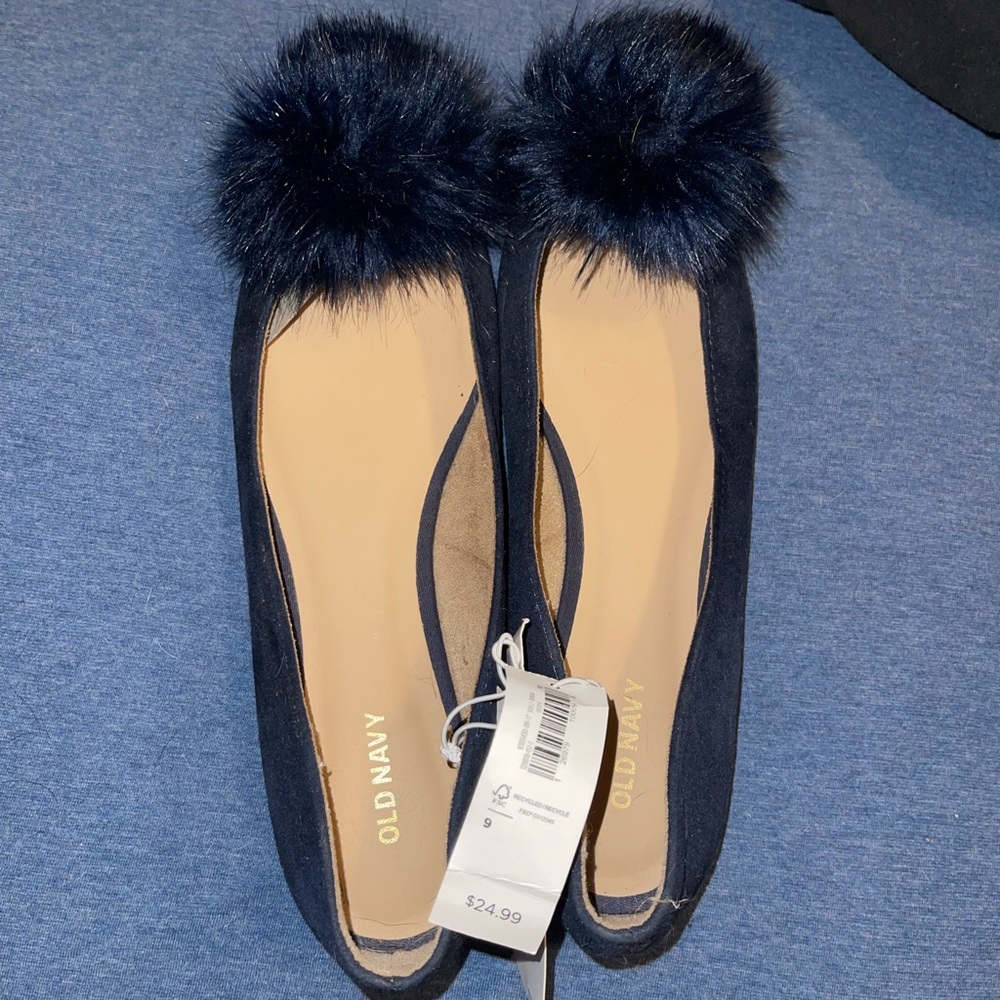 Navy pom pom flats